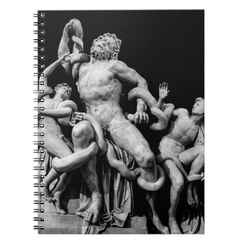 Laocoon Sculpture Over Black Notebook