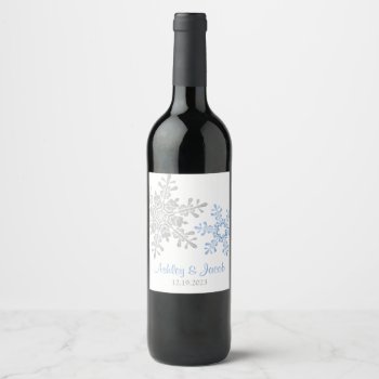 Lapis Blue Silver Snowflake Wedding  Wine Label by wasootch at Zazzle