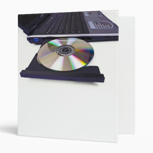 laptop computer with open optical disk drive cd 3 ring binder