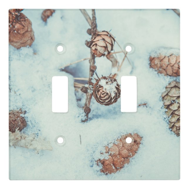 Larch cones on the fresh blue snow light switch cover (Front)