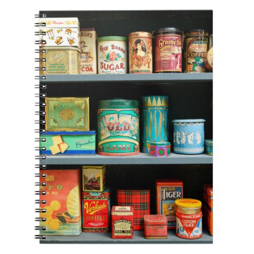 Large collection of colorful vintage cans displaye notebook