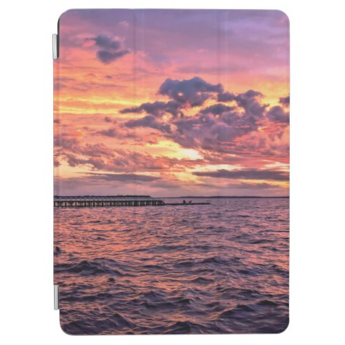 Large colourful sunset over waterbeachbeautifulc iPad air cover