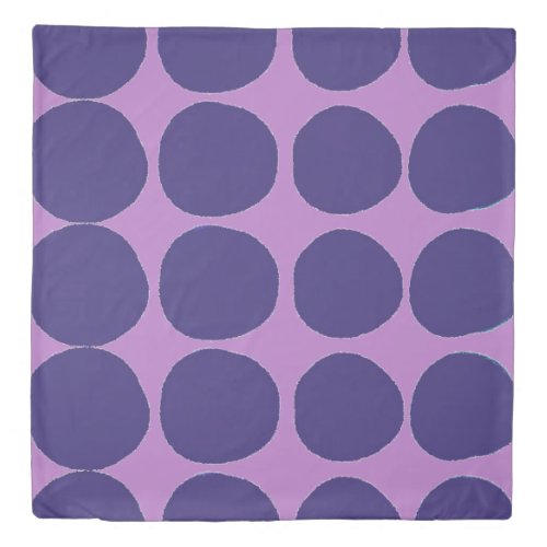 Large dark blue dots on purple duvet cover