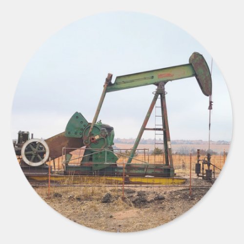 Large Green Pumpjack in an Oil Field Classic Round Sticker