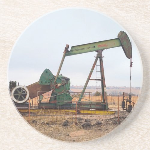 Large Green Pumpjack in an Oil Field Coaster