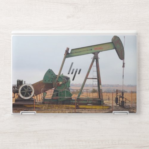 Large Green Pumpjack in an Oil Field HP Laptop Skin