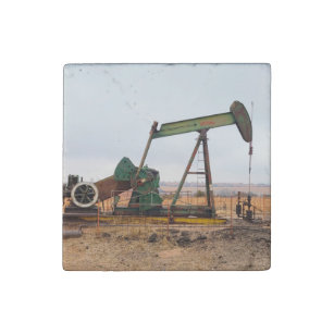 Large Green Pumpjack in an Oil Field Stone Magnet