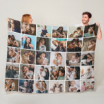 Large Modern 30-Photo Collage Fleece Blanket<br><div class="desc">This custom photo collage blanket design features a modern and heartwarming layout with a clean grid style that beautifully showcases cherished family memories. The seamless arrangement of photos creates a cozy and inviting look, perfect for highlighting special moments and celebrating meaningful connections. Ideal gift for birthdays, holidays, anniversaries, or special...</div>