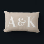 Large Monogram Initials on Solid Color Lumbar Pillow<br><div class="desc">This simple and stylish throw pillow features a solid color soft beige background with large monogram initials. You can personalize the pillow to include your own custom initials or text. It's perfect for representing a newlywed couple,  children,  or a family.</div>