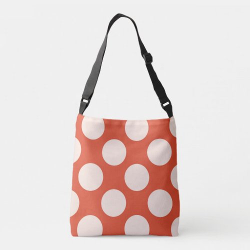 Large pink polka dots circles design on red crossbody bag