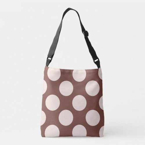Large pink polka dots design on brown crossbody bag