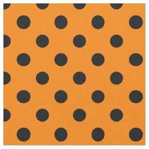 orange and black polka dot fabric