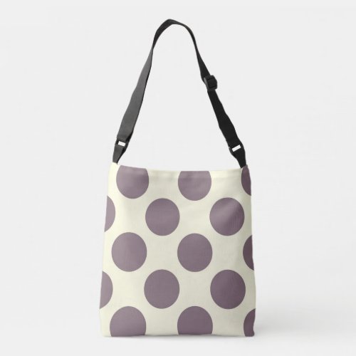 Large purple polka dots design on cream crossbody bag