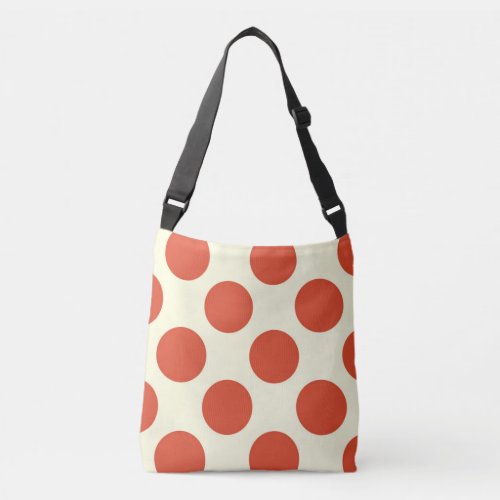 Large red polka dots design on cream crossbody bag