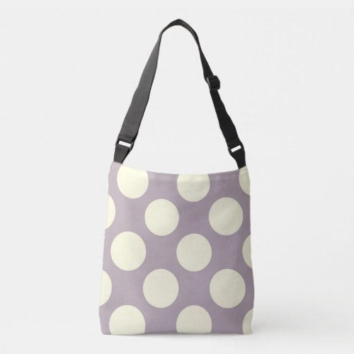 Large white polka dots design on purple crossbody bag