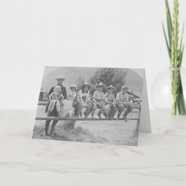 Larry Larom with six children. Card (Front)