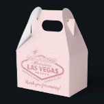 Las Vegas Party Hangover Recovery Kit Favor Favor Boxes<br><div class="desc">Personalized welcome to fabulous Las Vegas light sign in faux rose gold blush pink foil gable box with custom wording on the back for creating a hangover helper welcome kit for guests at your destination wedding. The boxes are nice and small, perfect for holding some pain reliever, hydration powders, B...</div>