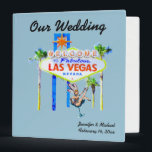 Las Vegas Wedding Album light blue 3 Ring Binder<br><div class="desc">Personalized Las Vegas Wedding album is a three ring binder which allows a couple to insert pages for photos. The famous welcome sign,  fun showgirl art,  and a pretty light blue background.</div>