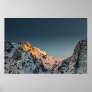 Last light before sunset on mountains poster