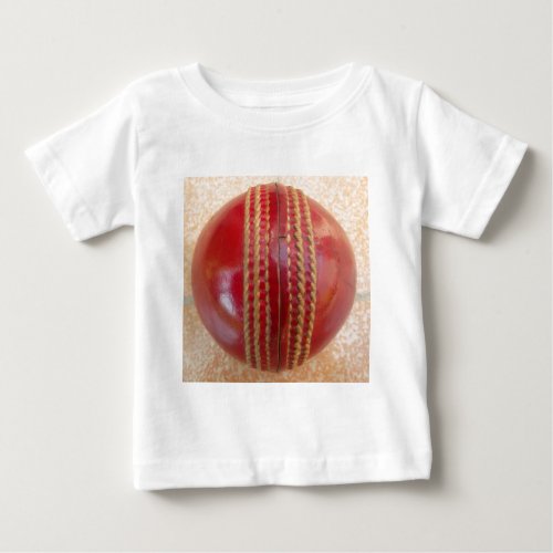 Latest International Red Leather Cricket Ball Baby T_Shirt