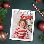 Laughing All The Way Rainbow Kids Christmas Photo Holiday Postcard<br><div class="desc">Beautiful,  colorful full photo Christmas postcard with Laughing All the Way in pretty rainbow cursive script. Personalize with your favorite vertical family photograph of your smiling child above your name or custom greeting in red. Fun and cheerful holiday postcards.</div>