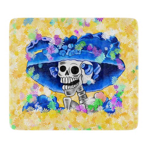 Laughing Skeleton Woman in Blue Bonnet on Yellow Cutting Board
