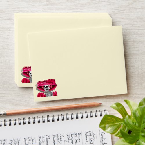 Laughing Skeleton Woman in Red Bonnet Envelope