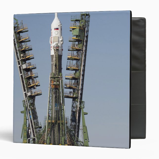 Launch scaffolding is raised into place binder (Front/Inside)
