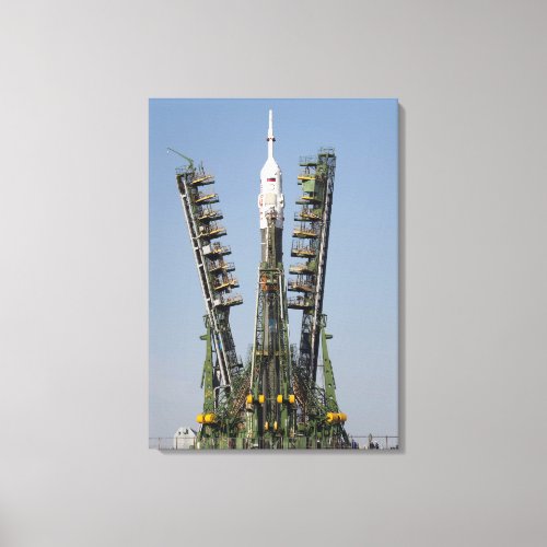 Launch scaffolding is raised into place canvas print