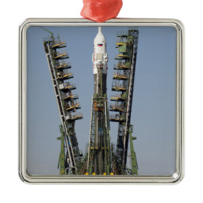 Launch scaffolding is raised into place metal ornament