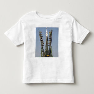 Launch scaffolding is raised into place toddler t-shirt