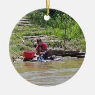 Laundry Day on the River Ceramic Ornament