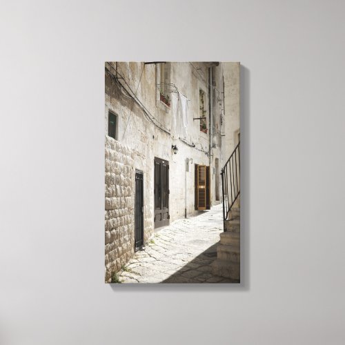 Laundry hanging to dry in an alley in Italy Canvas Print