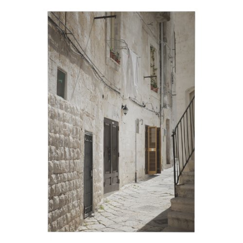 Laundry hanging to dry in an alley in Italy Faux Canvas Print