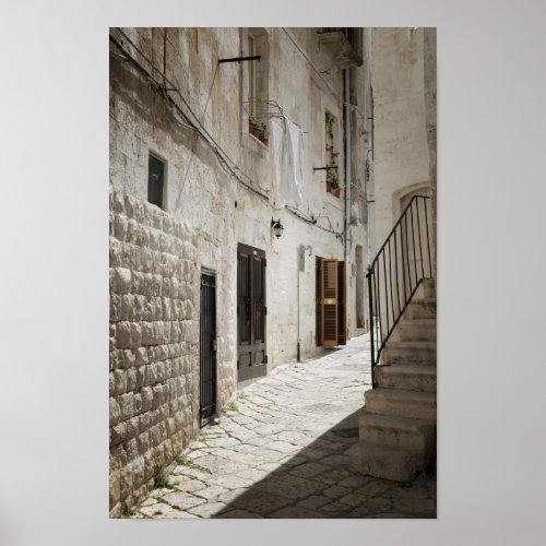 Laundry hanging to dry in an alley in Italy Poster