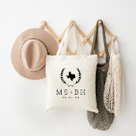 Laurel Crest Texas Wedding Monogram Tote Bag<br><div class="desc">Custom printed tote bags make a fun and functional wedding favor your guests will love! Personalize the template with the bride and groom's names or monogram initials. Add your wedding date, the city, state or venue name or any other custom text. This modern rustic logo-style design has a laurel branch...</div>
