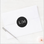 Lauren Black Monogram Elegant Wedding Classic Round Sticker<br><div class="desc">Simple wedding stickers featuring a modern yet elegant design with your two initial monogram in a white serif font over a black background. The background and font colors may be changed to any colors that you wish. A chic and stylish design that is great for a minimalist couple. These stickers...</div>