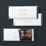Lauren Rose Gold Monogram Elegant Wedding Hershey Bar Favors<br><div class="desc">Simple personalized Hershey's Bar Wedding Favors featuring a modern yet elegant design with your two letter monogram along with your names and date in faux rose gold pink over a white background. The back has your personalized message. The font and background colors may be changed to any colors you wish...</div>