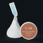 Lauren Terracotta Monogram Elegant Wedding Hershey®'s Kisses®<br><div class="desc">Simple Wedding Favor Hershey's Kisses featuring an elegant and timeless design with your two letter monogram, names and wedding date. All design elements are in white over a terracotta / burnt orange / rust earth tones background and may be changed in the design editing tool. A clean and classic design...</div>