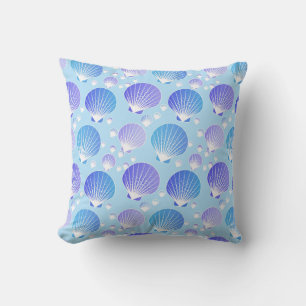 Lavender and blue seashells on pale blue throw pillow