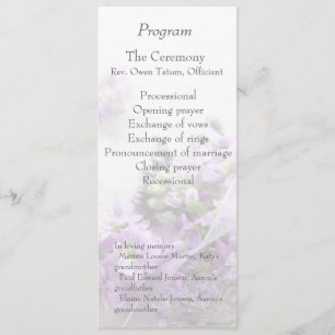 Lavender-colored flowers fade wedding program