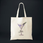 Lavender Tini Bridesmaid Bachelorette Martini Tote Bag<br><div class="desc">Bring along your bachelorette weekend essentials with this stylish Lavender Martini tote bag,  featuring a watercolor martini. Perfect for bridesmaids,  maid of honor gifts,  and wedding weekend swag,  this spacious and durable tote ideal for carrying beach towels,  wedding essentials,  and more.</div>