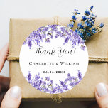 Lavender violet wedding thank you classic round sticker<br><div class="desc">A stylish white background decorated with watercolored lavender flowers.  Personalize and add your names and wedding date. With the text: Thank you!</div>