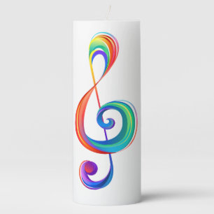 Layered rainbow treble clef pillar candle