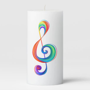 Layered rainbow treble clef pillar candle
