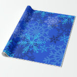 Layered Snowflakes on Blue Wrapping Paper