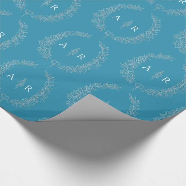 Leaf oval monogram drawing silver on teal aqua wrapping paper (Corner)