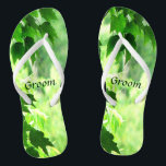 Leafy Wedding Groom Flip Flops<br><div class="desc">These Groom wedding flip flops invite you to enter a leafy summer world of nature. Maple leaves frame a sunny woodland forest scene with shades of yellow,  white and green.  Customize the text for your special occasion.</div>