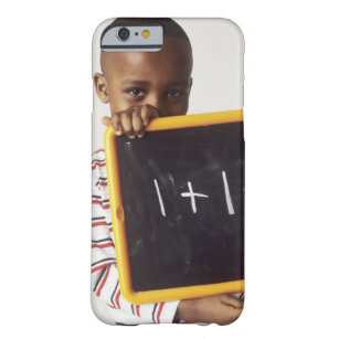 Learning arithmetic. 4-year-old boy holding a barely there iPhone 6 case