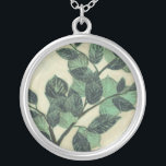 Leaves and Branches on Cream Background Silver Plated Necklace<br><div class="desc">Vibrant green leaves and branches rest on a cream background in this print by Jennifer Goldberger. As the season change the colors on these leaves stay the same,  bringing a little consistency into your life.</div>